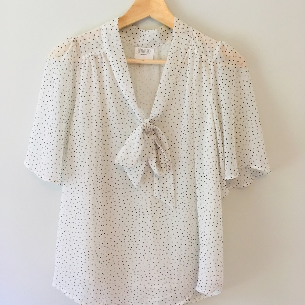 White polka dot tie front secretary blouse